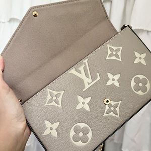 Félicie Pochette in Dove/Cream Monogram Empreinte Authentic Leather.